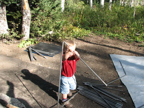 Lego helping set up the tent.